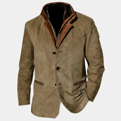 Veste - Blazer en suède kaki avec col en cuir marron contrastant, fermeture à boutons et poches passepoilées, offrant une allure élégante et masculine.