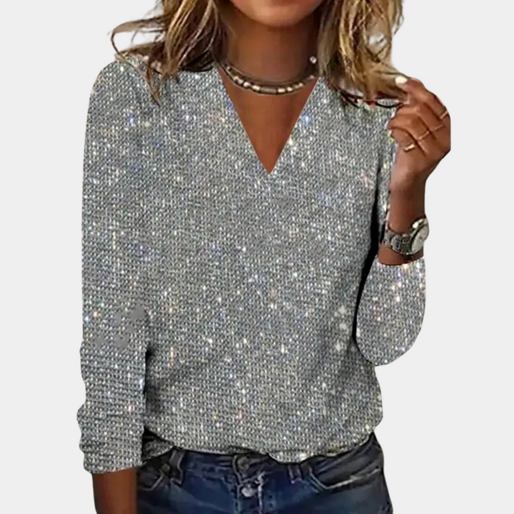 Blouse chic pour femme Satin à sequins, avec un décolleté en V et des manches longues, idéale pour un look étincelant et élégant lors de soirées ou événements spéciaux.