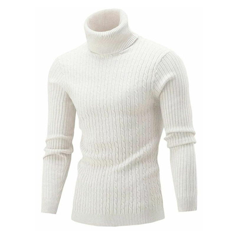 Pull tricoté blanc en maille torsadée avec col roulé ajusté, offrant élégance et confort thermique pour l’hiver.