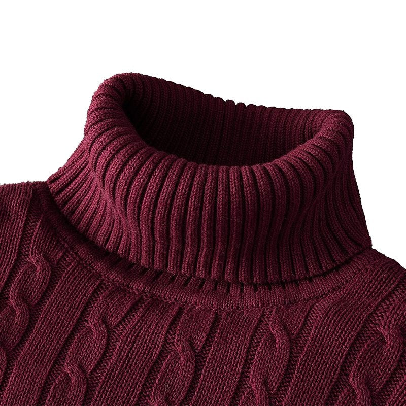  Pull en maille torsadée bordeaux avec col roulé épais, conçu pour offrir chaleur, confort et élégance durant la saison froide.