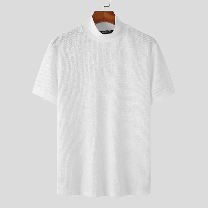 Chemise à manches courtes pour homme Terence, style tendance, en tissu texturé blanc, coupe moderne avec col rond, parfaite pour un look épuré, élégant et confortable.