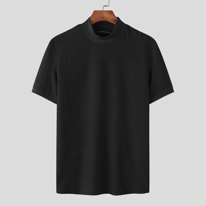 Chemise à manches courtes pour homme Terence, style tendance, en tissu texturé noir, coupe moderne avec col rond, idéale pour un look élégant et polyvalent au quotidien.