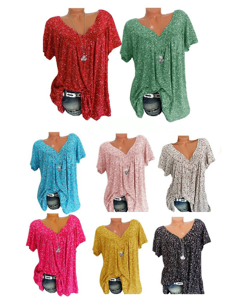 Présentation de la blouse Verity pour femme à manches courtes, coupe ample et col V, avec imprimé fleuri moderne  disponible en plusieurs couleurs (rouge, vert, bleu, rose, beige, fuchsia, jaune et noir.