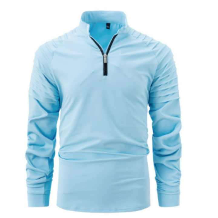 Polo pour homme Xavier, moderne et élégant, de couleur bleu clair. Ce polo à manches longues présente des détails structurés sur les épaules et un zip noir au col. Idéal pour un look sportif et tendance, il allie confort et style raffiné.
