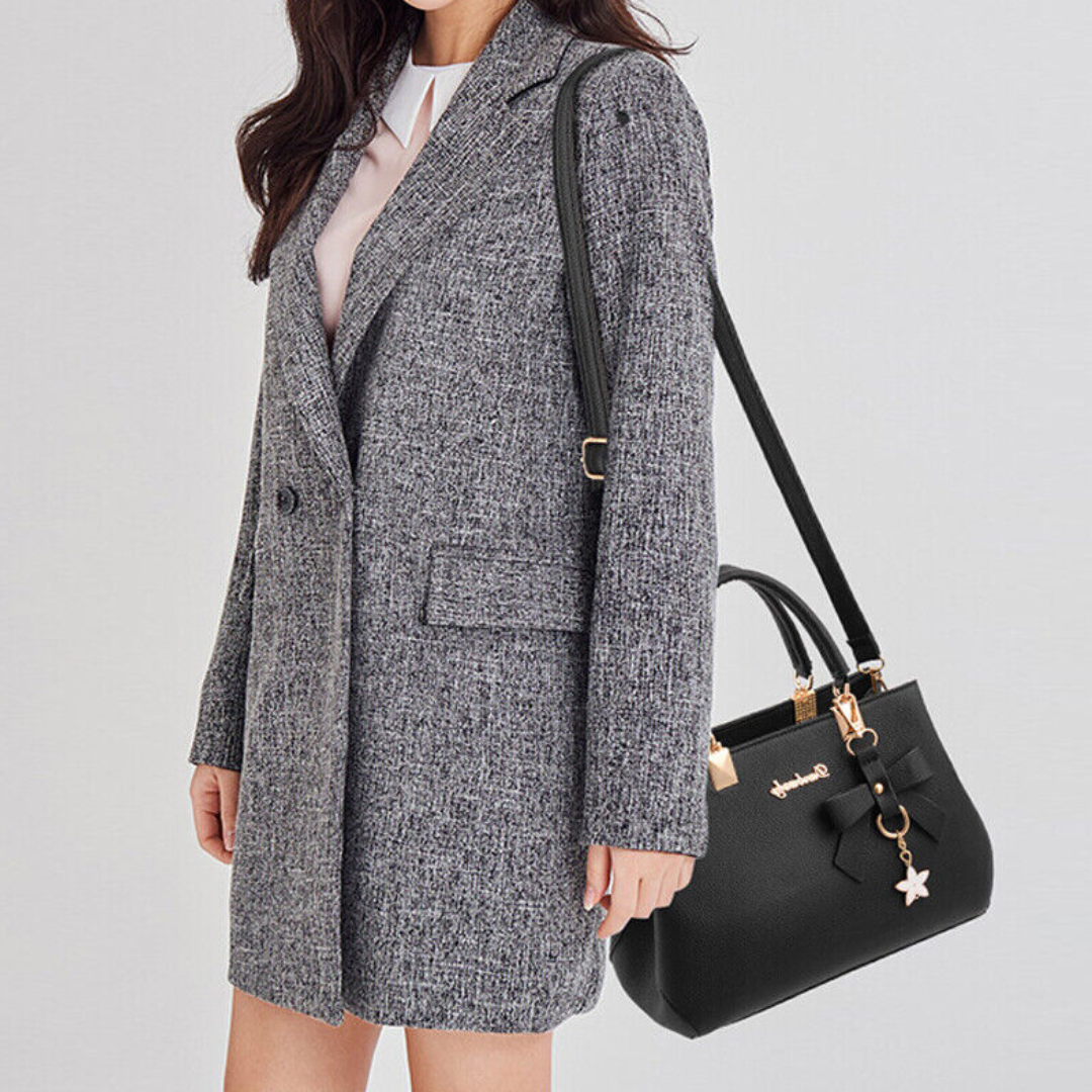 Sac Claudete élégant à bandoulière pour femme, ligne raffinée adaptée aux tenues polyvalentes.