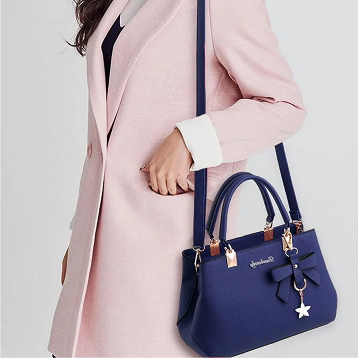 Sac Claudete élégant à bandoulière pour femme, ligne raffinée adaptée aux tenues polyvalentes.