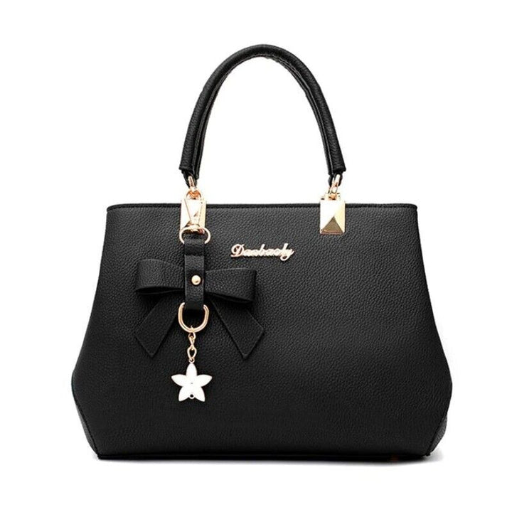 Sac Claudete élégant à bandoulière pour femme, ligne raffinée adaptée aux tenues polyvalentes.