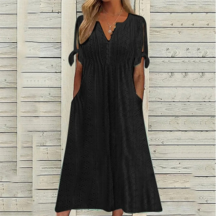 Robe Ludivine élégante pour femme, coupe raffinée et finitions soignées adaptées aux occasions habillées.