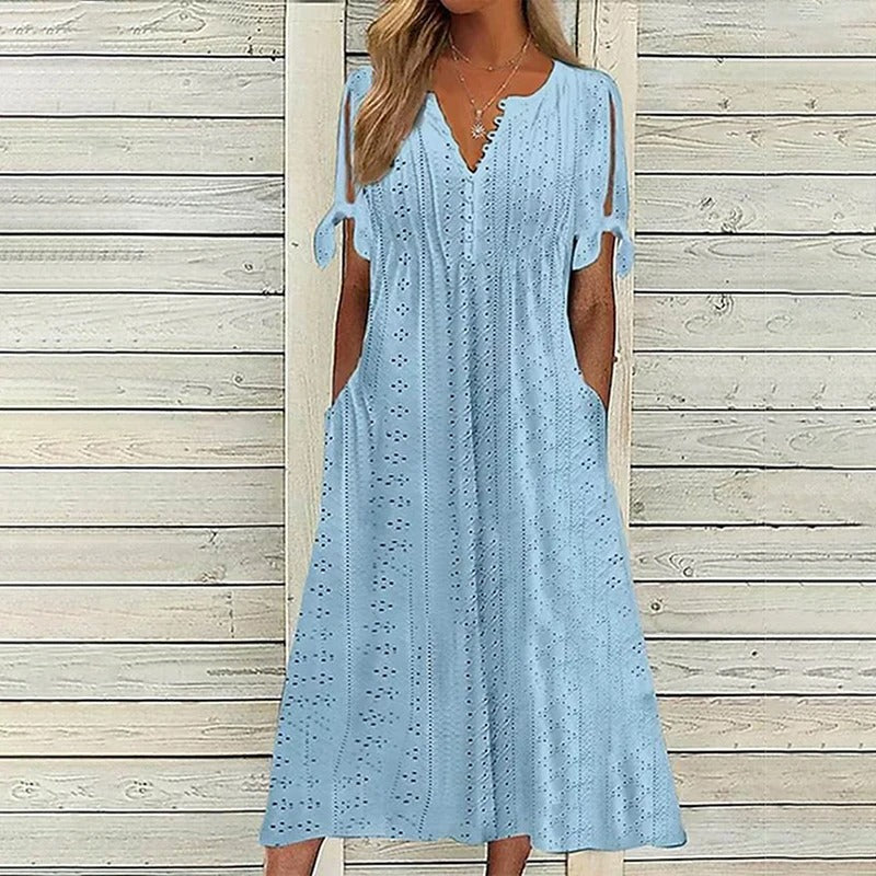 Robe Ludivine élégante pour femme, coupe raffinée et finitions soignées adaptées aux occasions habillées.